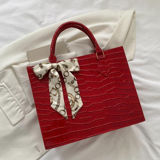 Luxury Handbag with Scarf Detailing