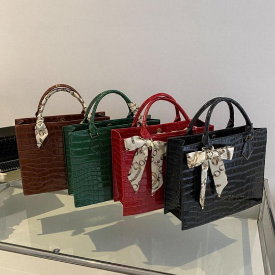 Luxury Handbag with Scarf Detailing