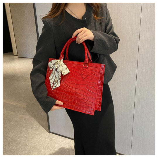 Luxury Handbag with Scarf Detailing