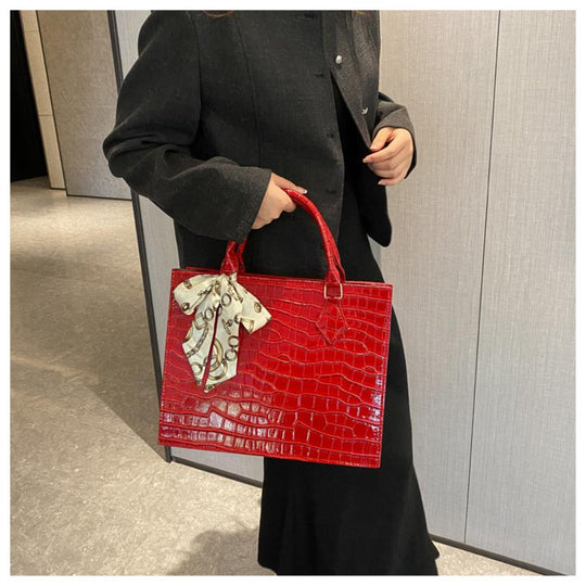 Luxury Handbag with Scarf Detailing