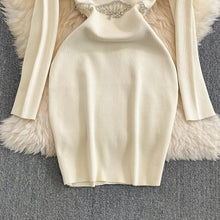 Eve Embellished Dress with cut-out Detailing