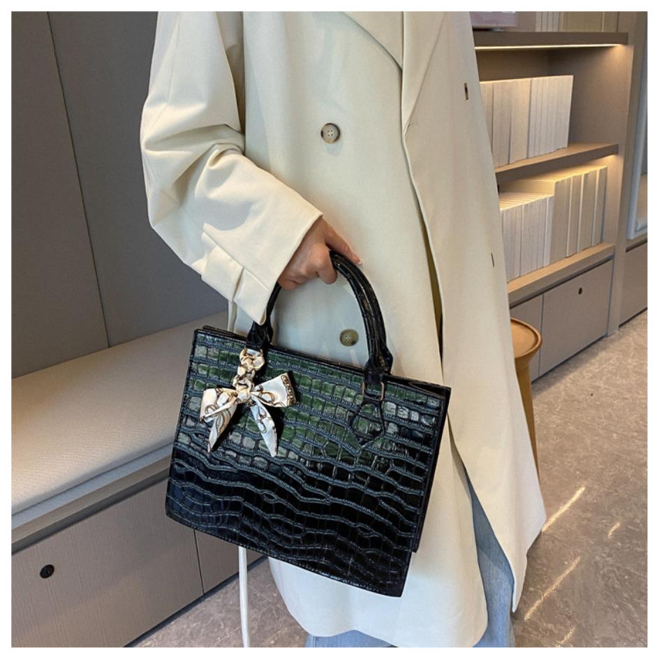 Luxury Handbag with Scarf Detailing