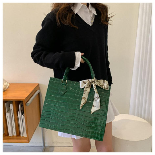 Luxury Handbag with Scarf Detailing