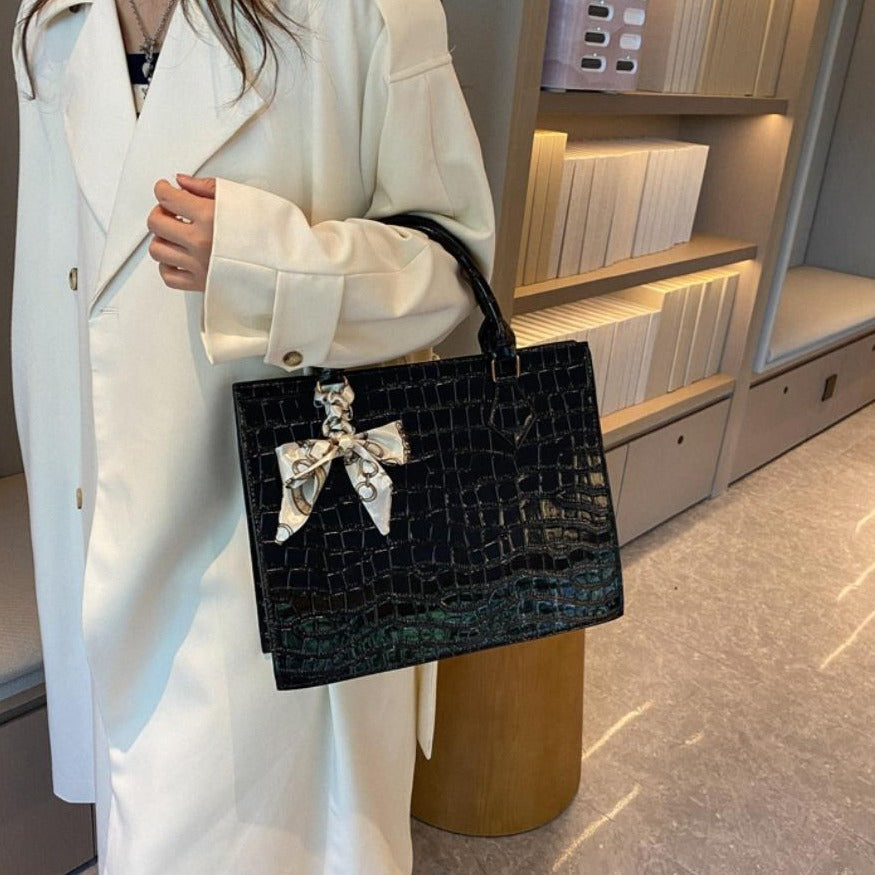 Luxury Handbag with Scarf Detailing
