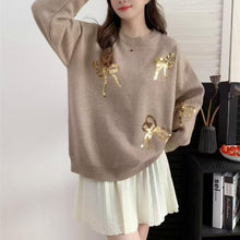 Crystella 3D Sequinned Bow detailing Sweaters