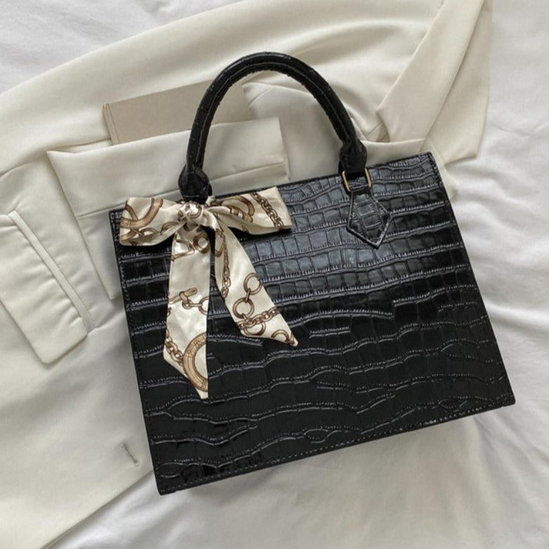 Luxury Handbag with Scarf Detailing