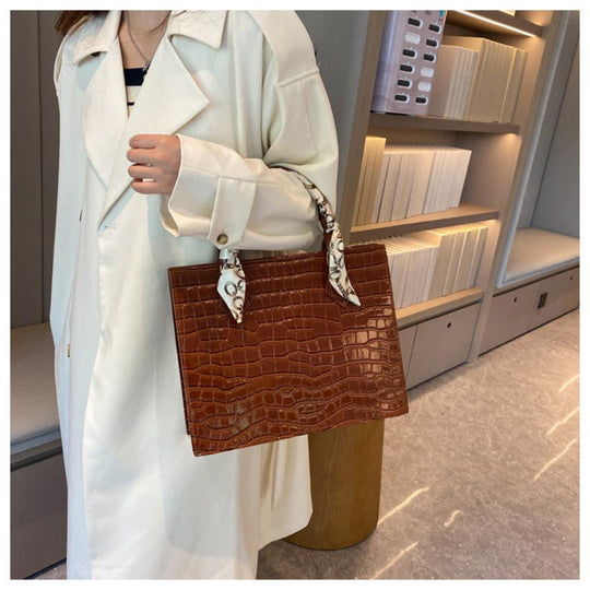 Luxury Handbag with Scarf Detailing