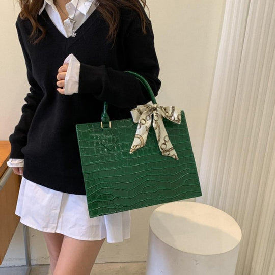 Luxury Handbag with Scarf Detailing