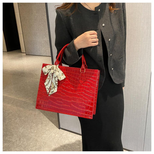 Luxury Handbag with Scarf Detailing