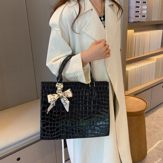 Luxury Handbag with Scarf Detailing