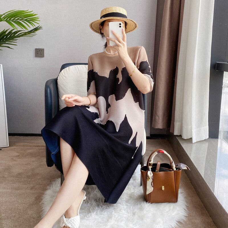 Darla Geometric print Designer Dress with Pearl Detailing