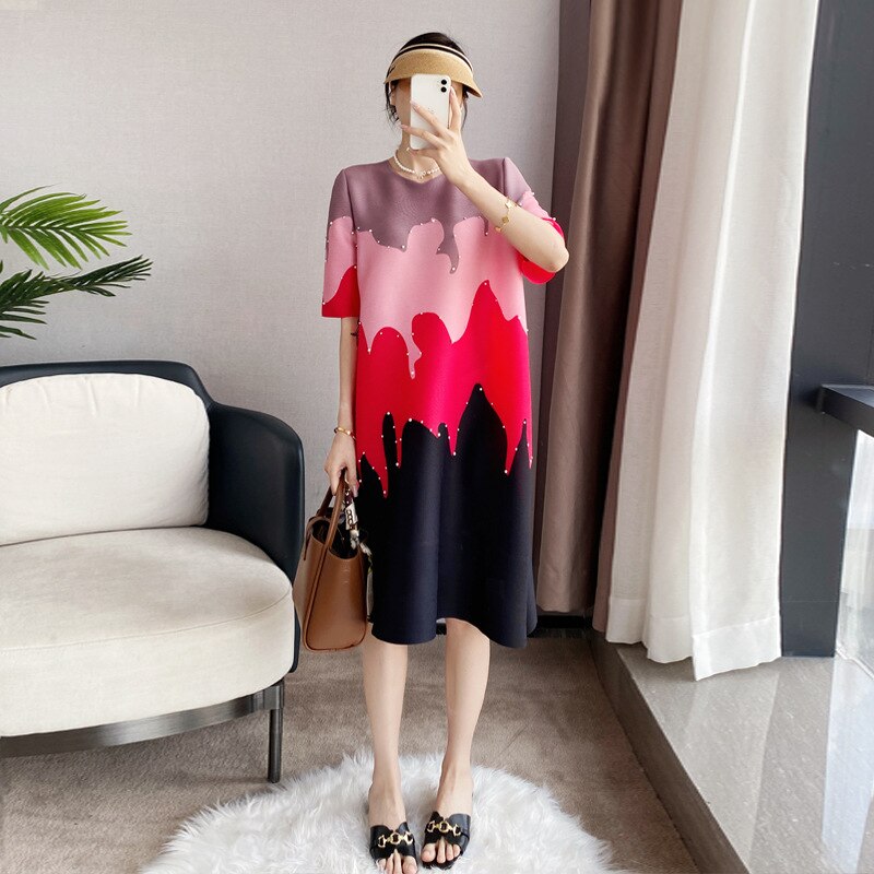 Darla Geometric print Designer Dress with Pearl Detailing