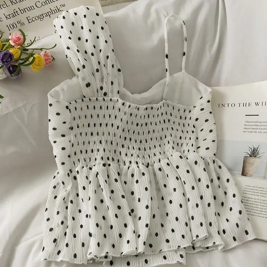 Linda Asymmetrical dotted peplum top