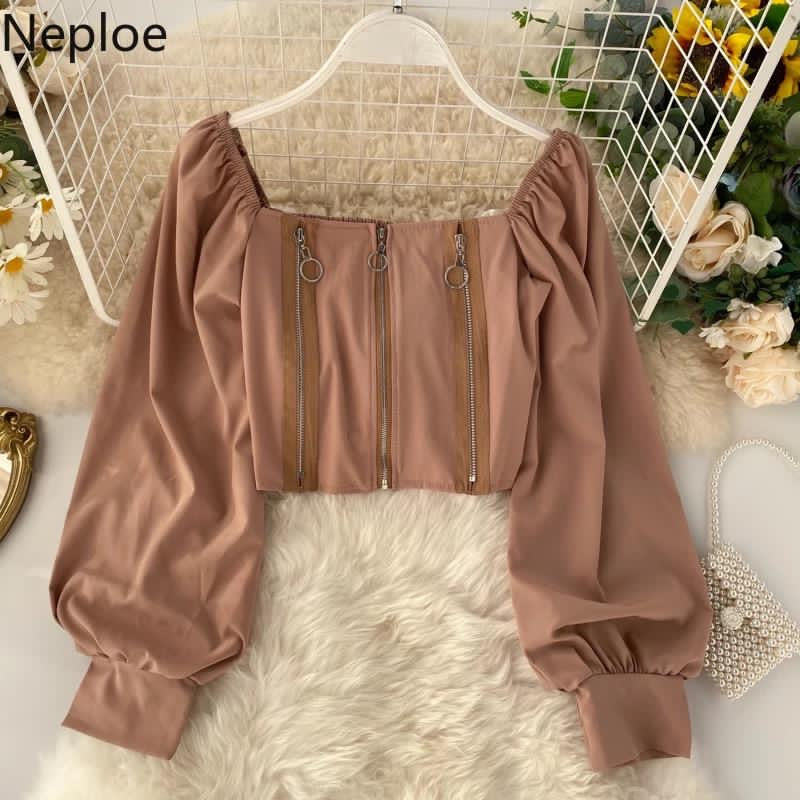 Krabi zipper chained top with lantern sleeves